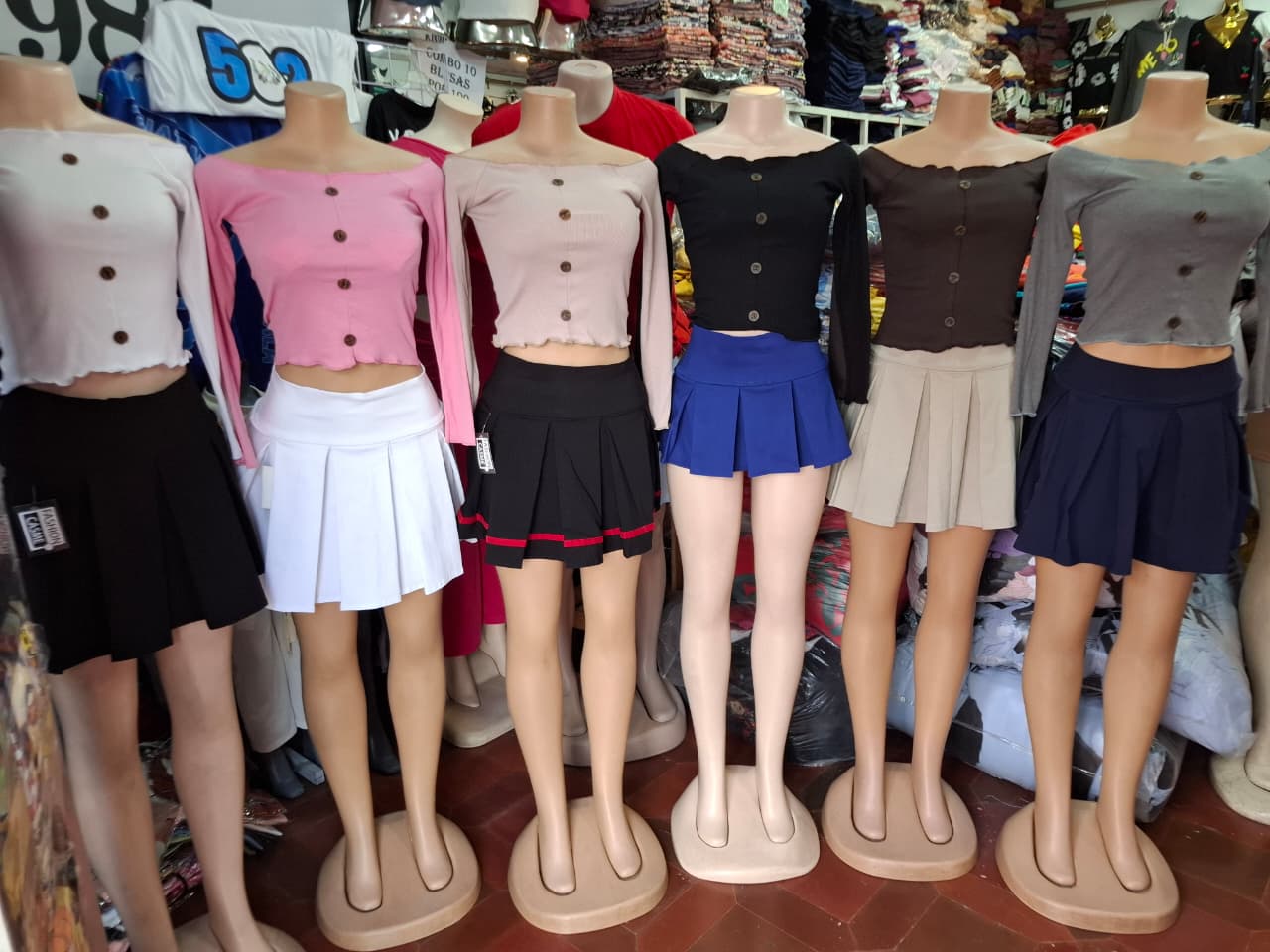 Blusa maga larga rasgada botones 