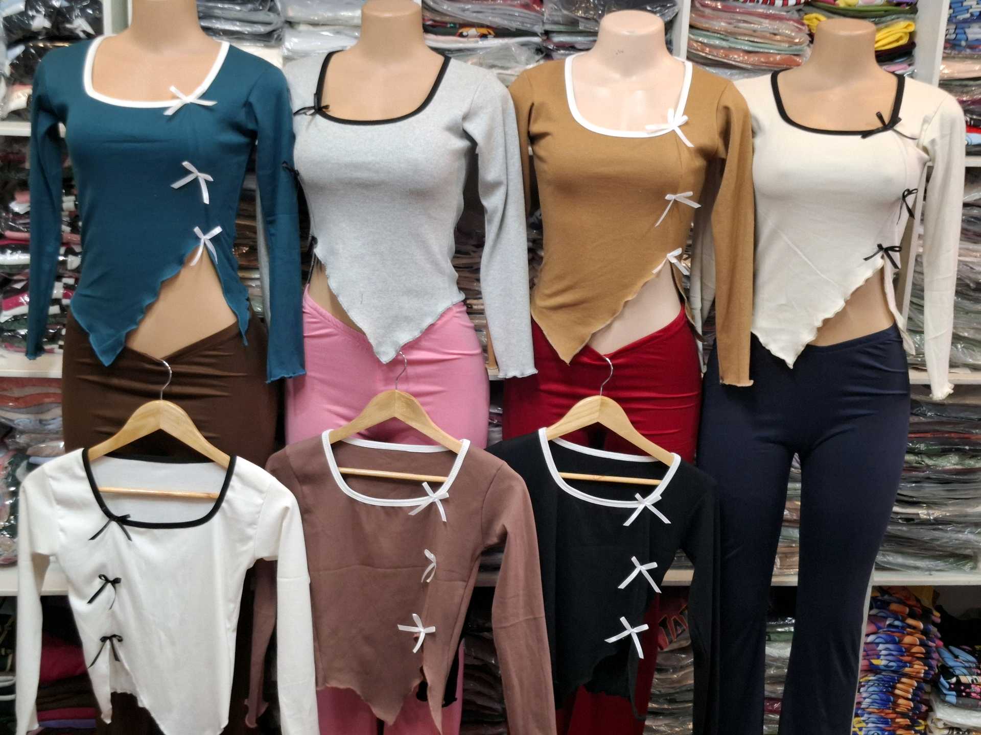 Blusa M/larga picó abertura Moños 